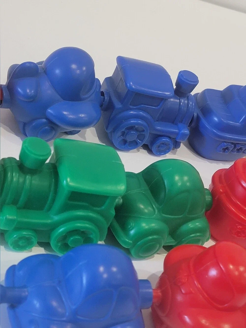 Colorful Interlocking Toy Train Cars - Red, Blue, Green, Yellow